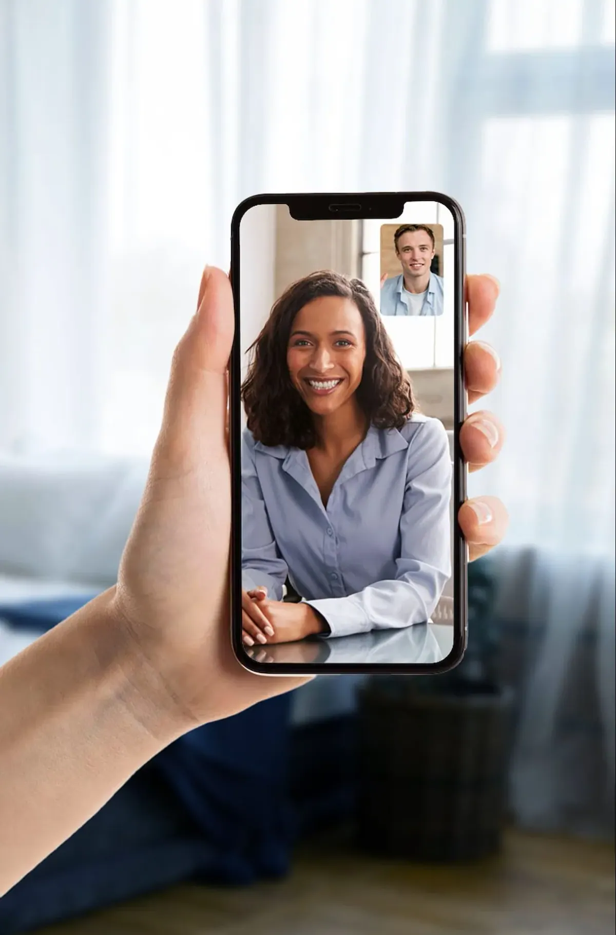 A patient on a video visit with a sleep care provider on their phone