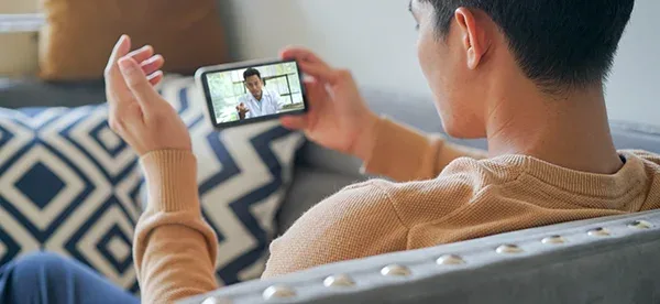 A person on a telehealth video visit