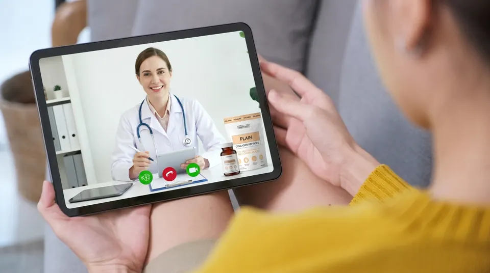Patient discussing supplements with a functional medicine provider by video consultation